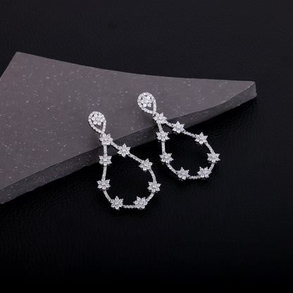 Silver Flower Studded Dangler Earrings